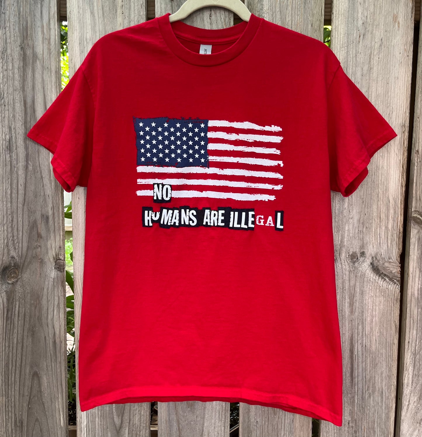 NO HUMANS ARE ILLEGAL Tee | M