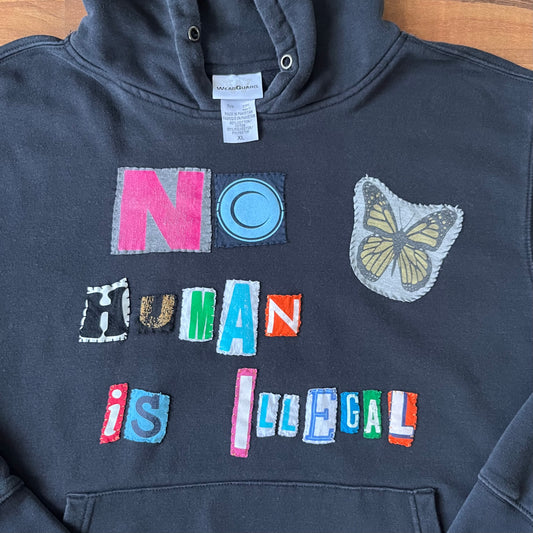 Black NO HUMAN IS ILLEGAL Hoodie | XL