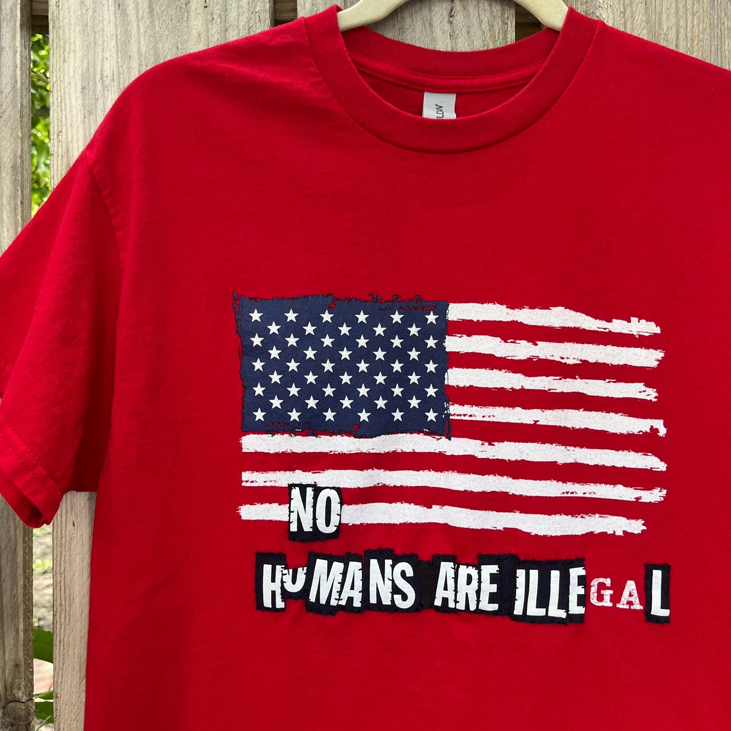 NO HUMANS ARE ILLEGAL Tee | M