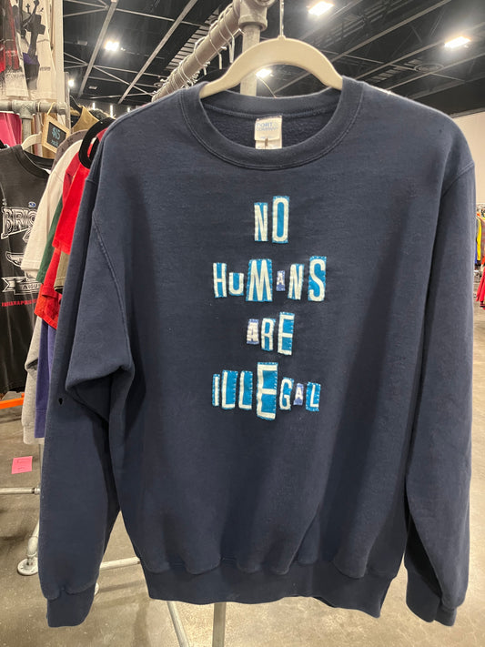 NO HUMANS ARE ILLEGAL | M