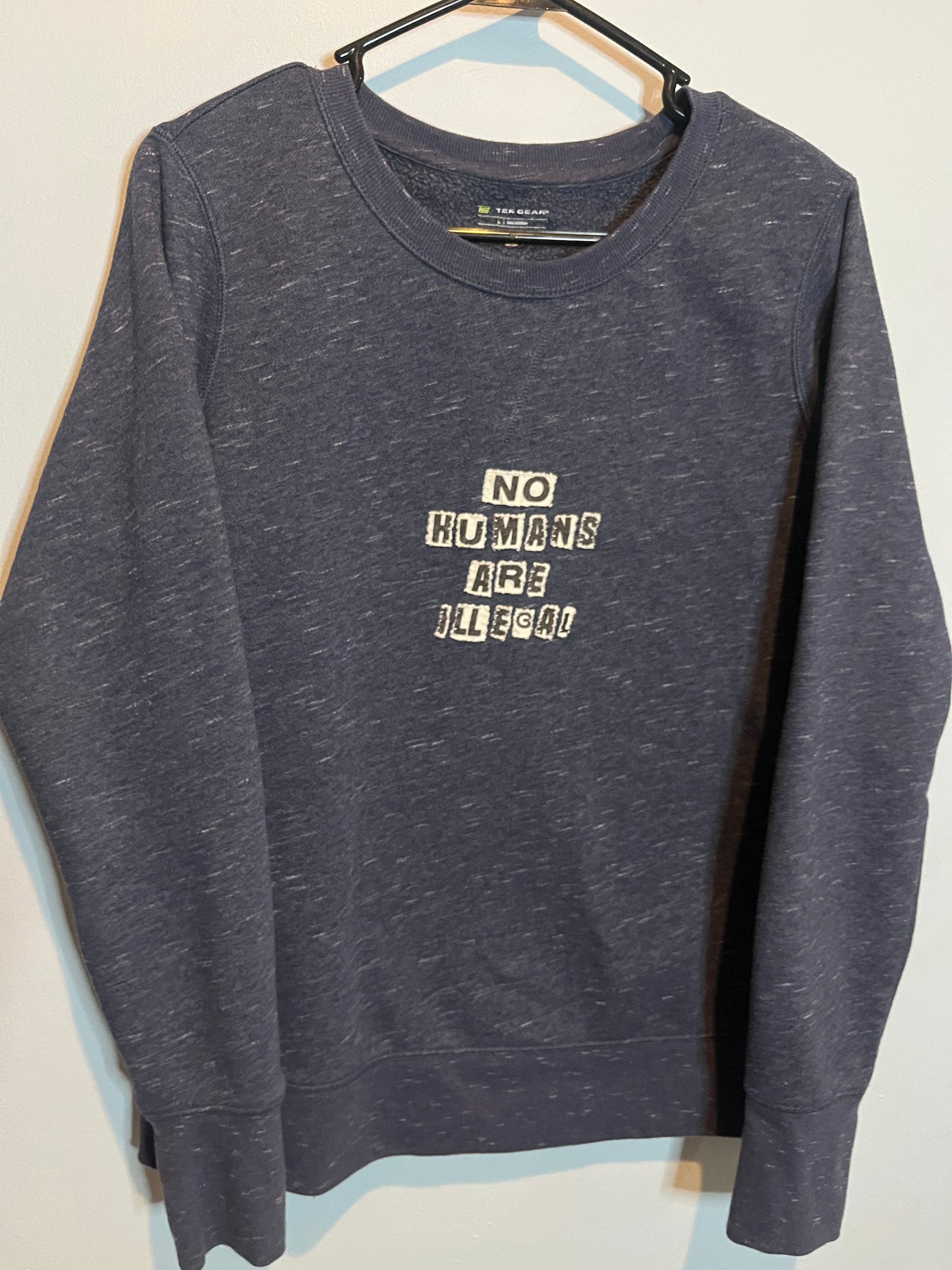 NO HUMANS ARE ILLEGAL | M